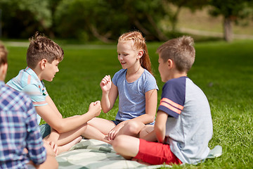 Image showing happy kids playing rock-paper-scissors game