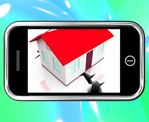 Image showing Cracked Foundations On Smartphone Showing Damaged House