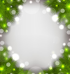 Image showing Christmas decorative border from fir twigs, glowing background