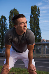 Image showing portrait of a young man on jogging