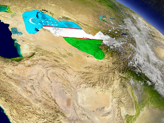 Image showing Uzbekistan with embedded flag on Earth