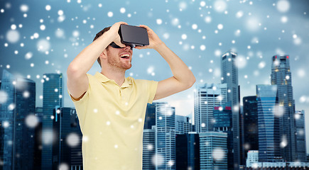 Image showing happy man in virtual reality headset or 3d glasses