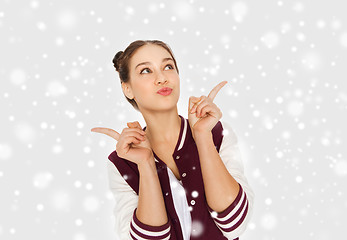 Image showing happy pretty teenage girl over snow