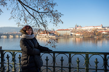 Image showing Beautiful Woman in Prague embankment on river Vltava