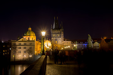 Image showing Night photo of Prague Charles Bridge and powder tower