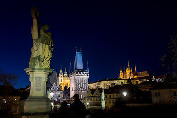 Image showing Night photo of Prague Charles Bridge and powder tower