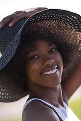 Image showing Close up portrait of a beautiful young african american woman sm