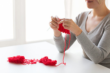 Image showing woman hands knitting with needles and yarn