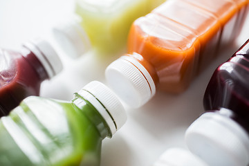 Image showing bottles with different fruit or vegetable juices