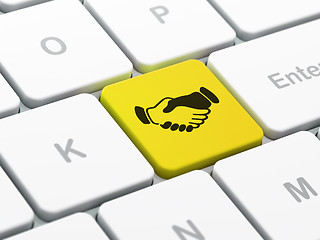 Image showing Finance concept: Handshake on computer keyboard background