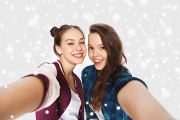 Image showing happy smiling pretty teenage girls taking selfie