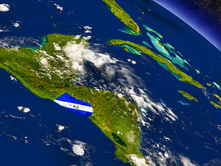 Image showing El Salvador with embedded flag on Earth
