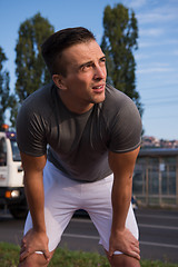 Image showing portrait of a young man on jogging