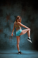 Image showing Attractive girl dancing twerk in the studio