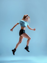 Image showing Attractive girl dancing twerk in the studio