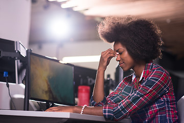 Image showing a young African American woman feels tired in the modern office