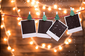 Image showing Empty instant photos with garland