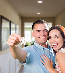 Image showing Military Couple with House Keys Inside Hallway