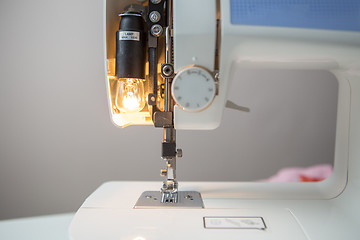 Image showing Sewing machine on gray background