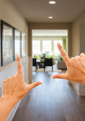 Image showing Framing Hands Looking Down Hallway of House