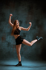 Image showing Attractive girl dancing twerk in the studio