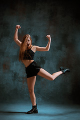 Image showing Attractive girl dancing twerk in the studio