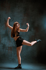 Image showing Attractive girl dancing twerk in the studio