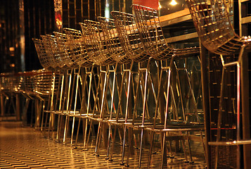 Image showing Chairs in row in bar