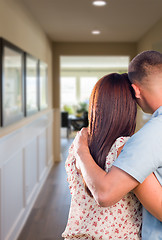 Image showing Military Couple Looking Down the Hallway of New House