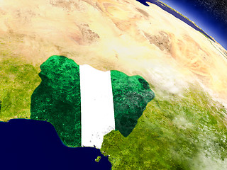 Image showing Nigeria with embedded flag on Earth