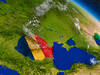 Image showing Romania with embedded flag on Earth