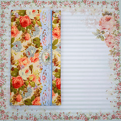 Image showing Scrapbooking holder for travel documents on floral paper
