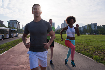 Image showing multiethnic group of people on the jogging