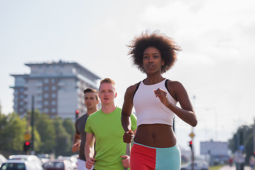 Image showing multiethnic group of people on the jogging