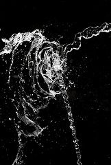 Image showing Water splash over black background