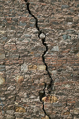 Image showing Cracked stone wall