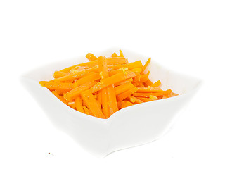 Image showing Closeup of carrot cut into julienne slices in a beautiful white 