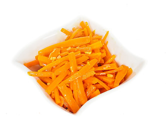 Image showing Closeup of carrot cut into julienne slices in a beautiful white 