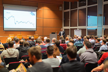 Image showing Business speaker giving a talk in conference hall.