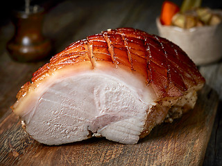 Image showing roasted pork on wooden table