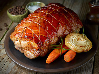 Image showing roasted pork on dark plate