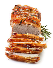 Image showing roasted sliced pork and rosemary