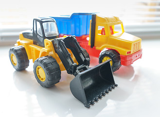 Image showing Toy Wheel Loader and Toy Dump Truck