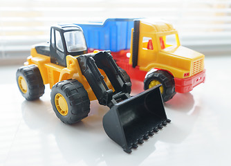 Image showing Toy Wheel Loader and Toy Dump Truck