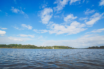 Image showing River landscape with a sailboat in the water