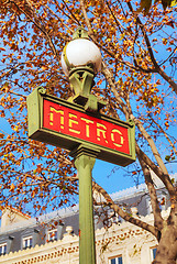 Image showing A pole with metro sign