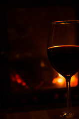 Image showing Romantic atmosphere with a glass of red wine