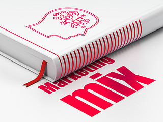 Image showing Advertising concept: book Head With Finance Symbol, Marketing Mix on white background