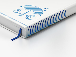 Image showing Safety concept: closed book, Money And Umbrella on white background