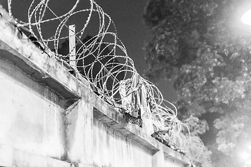 Image showing Wall with barbed wire